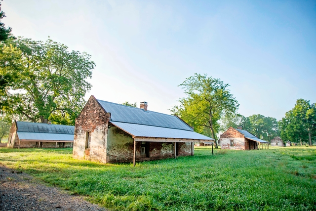 Brick cabins built to house enslaved workers, served as homes for tenant farmers into the 1960s.