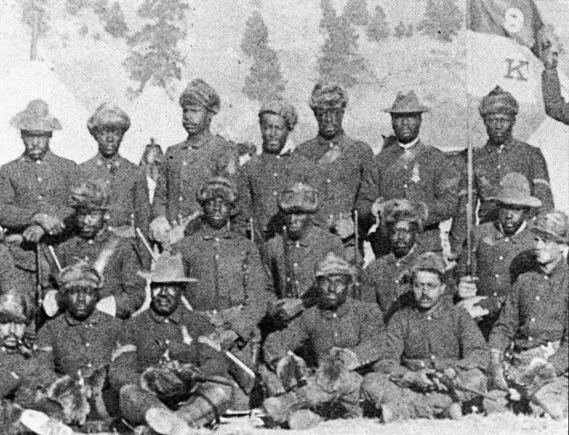 African American soldiers sitting, kneeling and standing for a casual photo