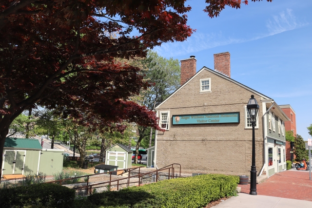 Historic building with lamppost and sidewalk