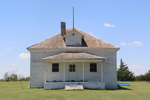 A wooden building painted white