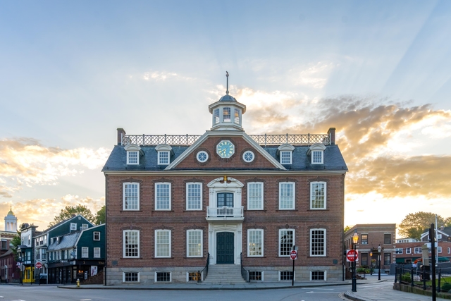 Historic Newport Colony House with brick facade and clock tower.