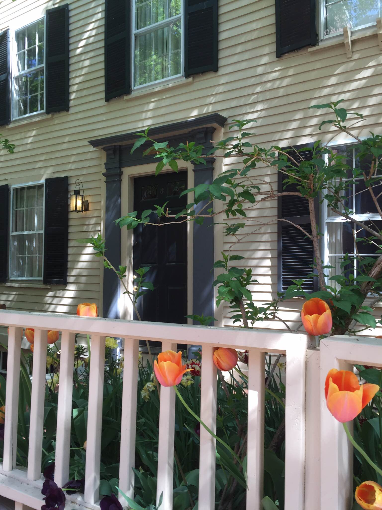 A yellow wooden house on Beacon Hill