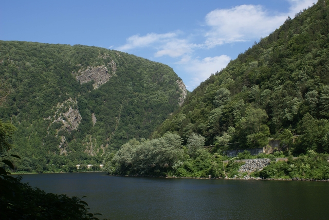 View of the Delaware River cutting between two low mountain peaks