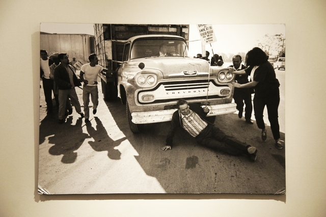 A black and white photo showing a farmworker demonstration