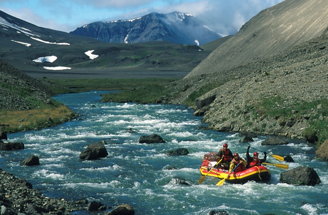 A lone raft floats the Aniakchak Wild River as it flows through the "Gates"