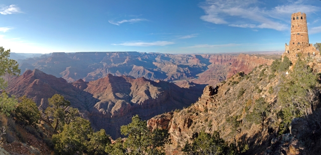 The Desert View Watchtower looms 70 feet into the air over a vast and dramatic view of the canyon.