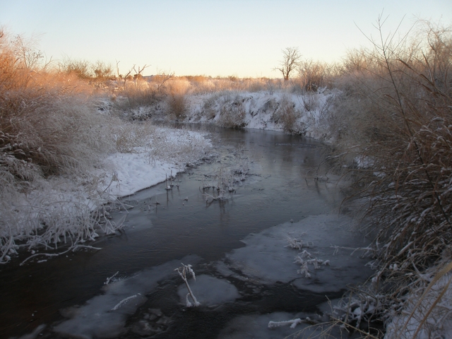 The Washita River in winter covered in ice and snow