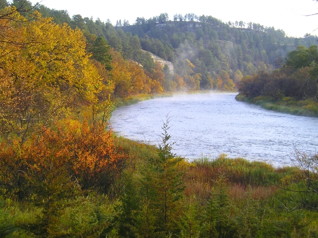 Yellows, oranges, and greens dominate the fall colors along the Niobrara NSR.