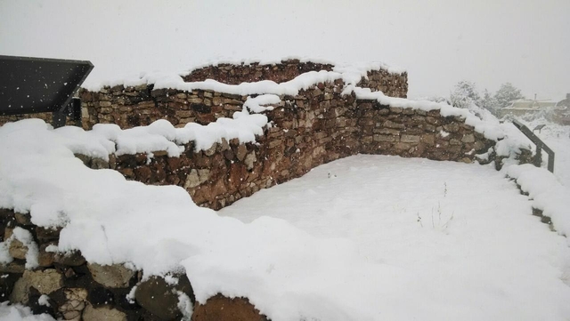 4 foot masonry walls covered in snow