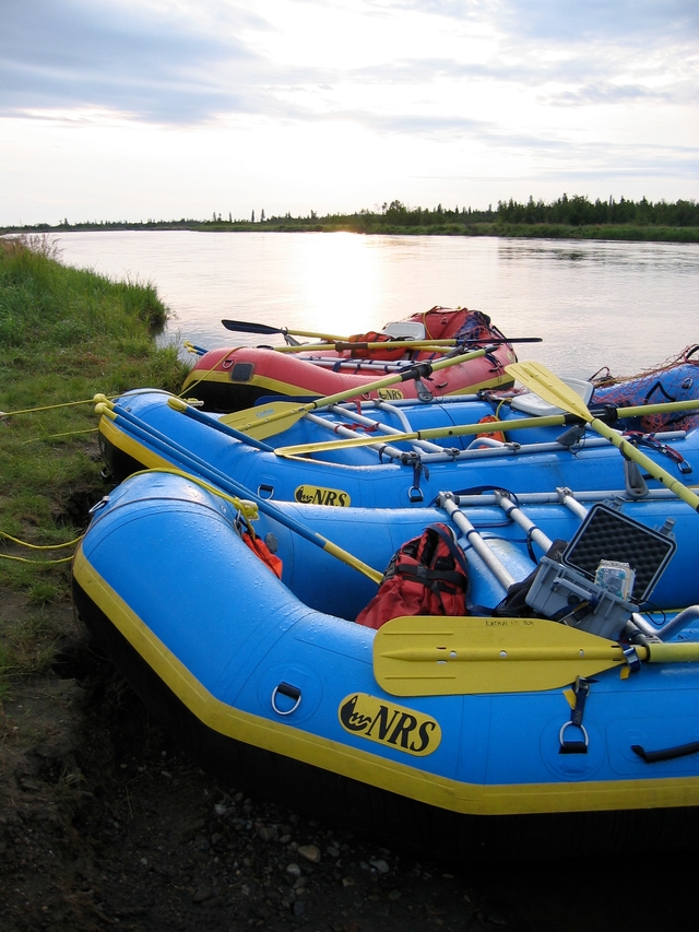 inflatable rafts on the edge of a river