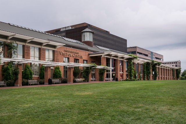 A color photo of the Independence Visitor Center showing a brick building with tall windows.