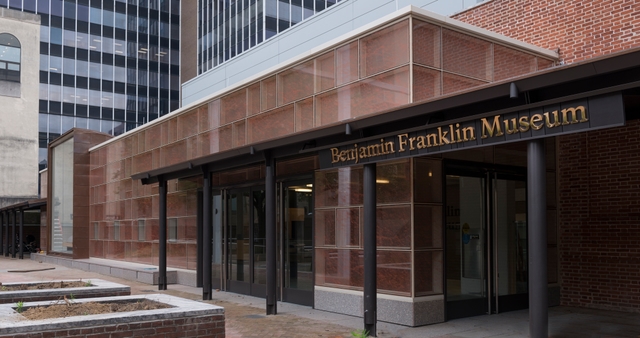 A color photo of the exterior of the Benjamin Franklin Museum in Franklin Court.