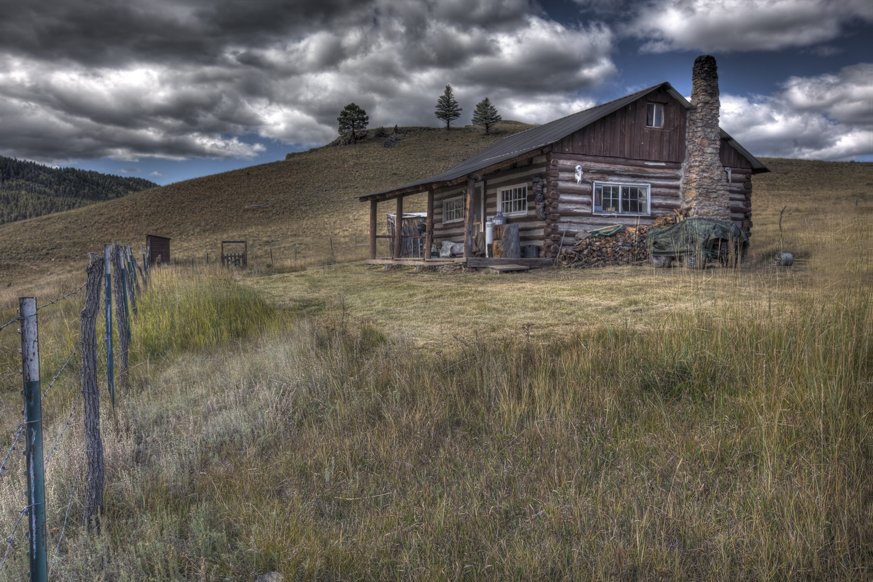 San Antonio cabin under a mostly cloudy sky