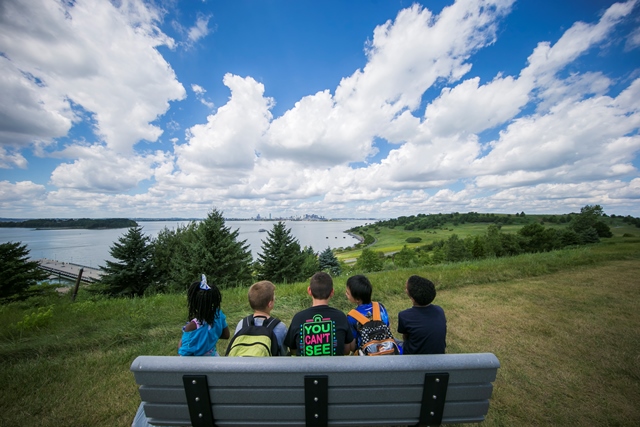 Children looking out at Boston from the Harbor Islands