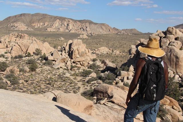 hiker looks over Hidden Valley