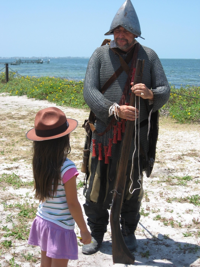 De Soto Tim Burke greets on of the parks Junior Rangers