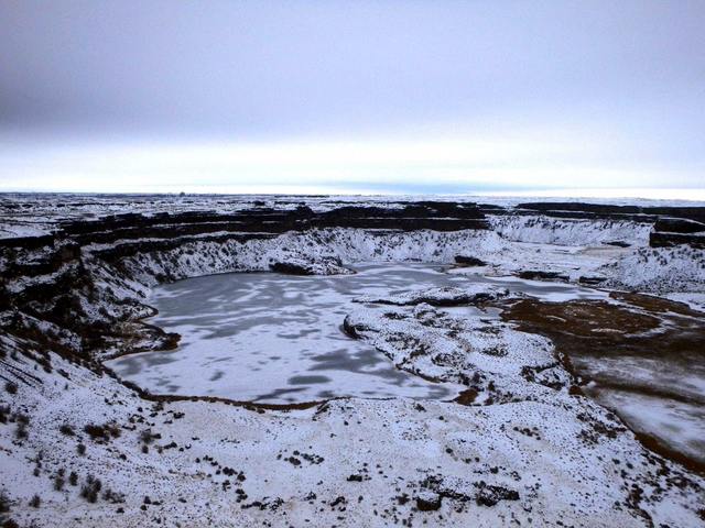 Dry Lake lake bed and falls blanked with snow.