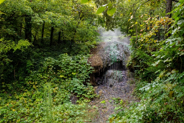 Misty water evaporating from a cascade