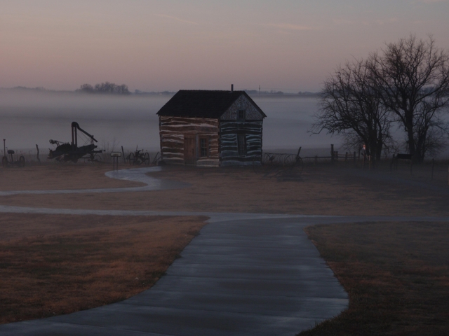 A homestead cabin at sunset