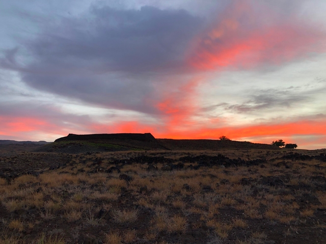 Sunrise over Pu'ukoholā Heiau in mid September.