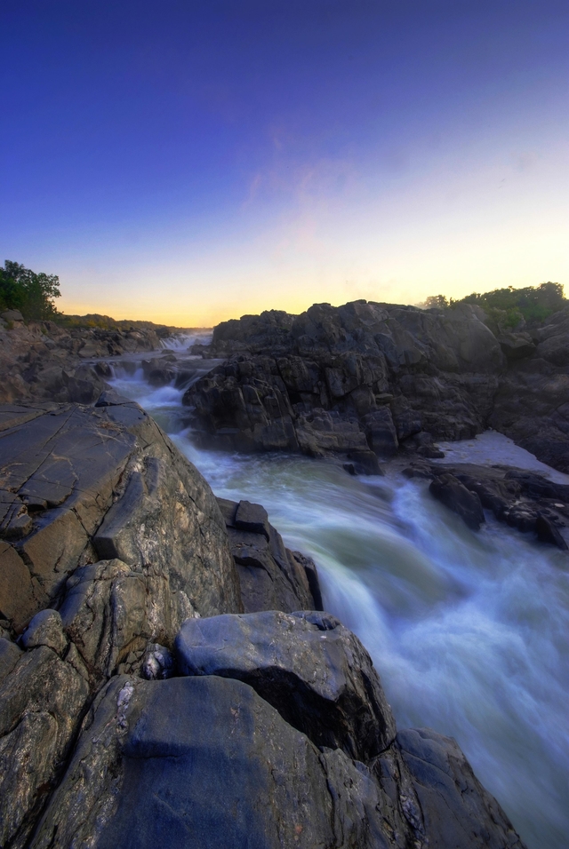 Great Falls with a purple sky near dusk